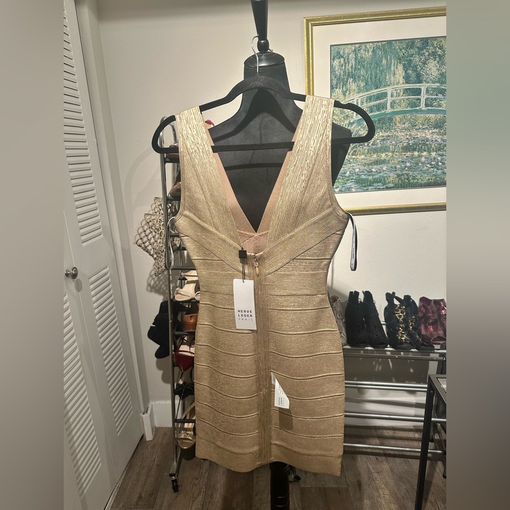 New with tags beautiful metallic gold Herve dress.